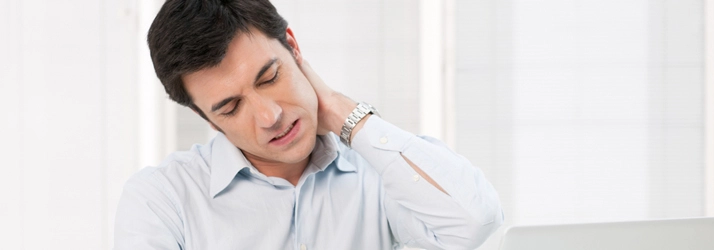 Chiropractic Downers Grove IL Man Suffering from Neck Pain